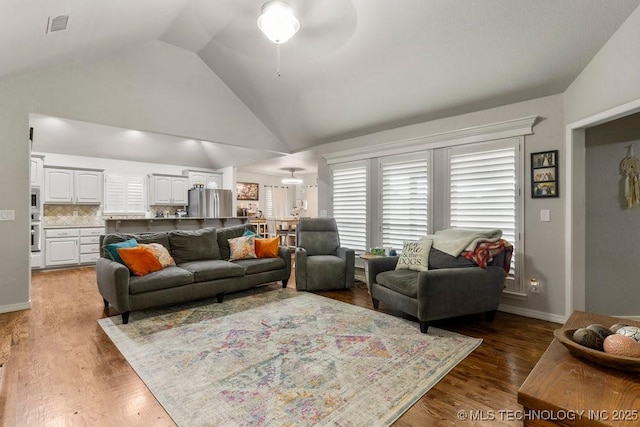 1516 W Trenton St, Broken Arrow, OK 74012 - living area with ceiling fan, wood finished floors, and high vaulted ceiling