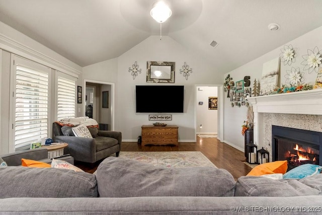 1516 W Trenton St, Broken Arrow, OK 74012 - living room with a ceiling fan, wood finished floors, a warm lit fireplace, and high vaulted ceiling