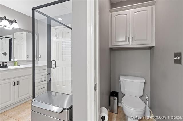 1516 W Trenton St, Broken Arrow, OK 74012 - bathroom with vanity, tile patterned flooring, and a shower