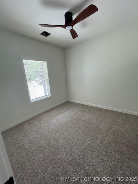 516 S Creek Ave S, Haskell, OK 74436 - carpeted spare room with a ceiling fan and baseboards