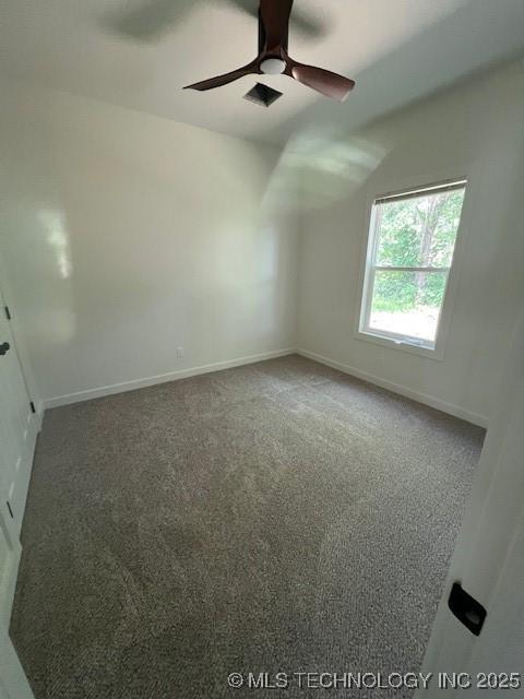 516 S Creek Ave S, Haskell, OK 74436 - empty room featuring carpet floors and a ceiling fan