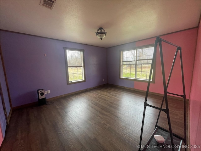 3176 E 2030th Rd, Sawyer, OK 74756 - unfurnished room with plenty of natural light and wood finished floors