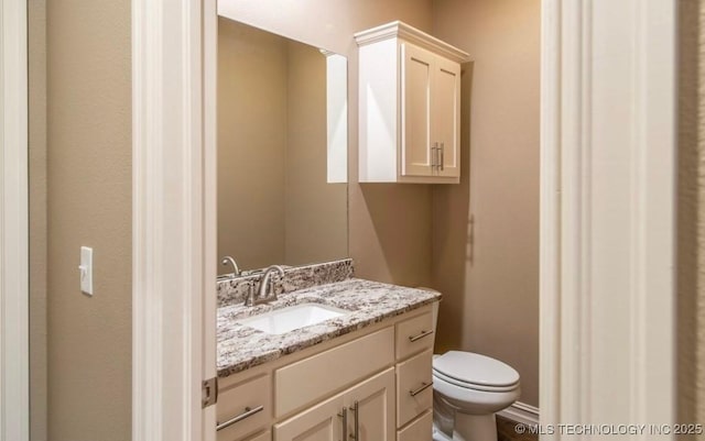 9022 N 65th Pl E, Owasso, OK 74055 - half bath featuring toilet and vanity