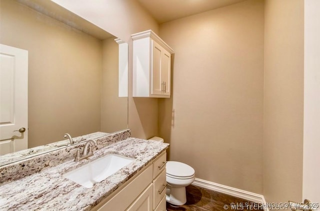 9022 N 65th Pl E, Owasso, OK 74055 - bathroom with toilet and vanity