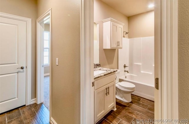 9022 N 65th Pl E, Owasso, OK 74055 - bathroom featuring vanity, shower / tub combination, and wood finished floors