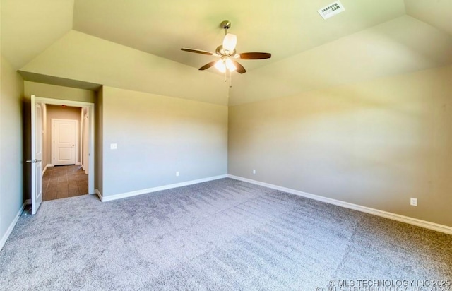 9022 N 65th Pl E, Owasso, OK 74055 - unfurnished room featuring carpet flooring, a ceiling fan, and vaulted ceiling