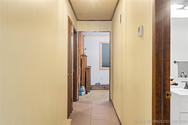 417530 E 1140th Rd, Checotah, OK 74426 - hallway featuring light tile patterned floors and crown molding