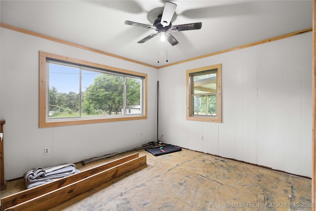 417530 E 1140th Rd, Checotah, OK 74426 - unfurnished room featuring a ceiling fan and ornamental molding