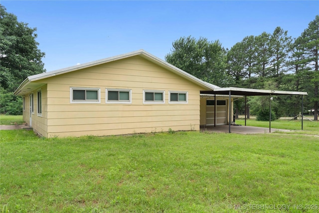 417530 E 1140th Rd, Checotah, OK 74426 - rear view of house with a lawn