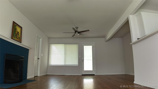 5921 S Sandusky Ave, Tulsa, OK 74135 - unfurnished living room with a ceiling fan, wood finished floors, and a brick fireplace