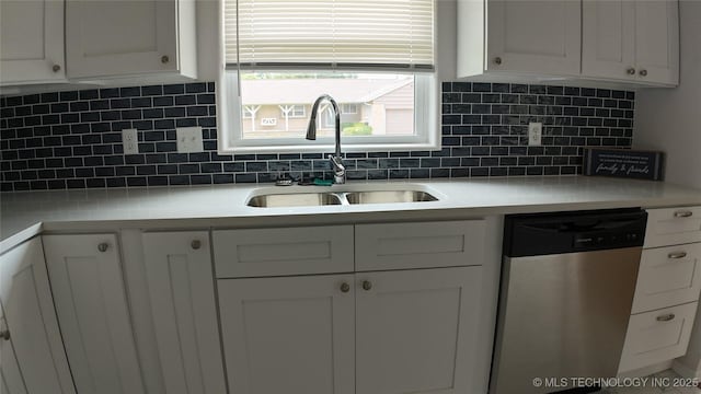 5921 S Sandusky Ave, Tulsa, OK 74135 - kitchen featuring dishwasher, tasteful backsplash, and light countertops