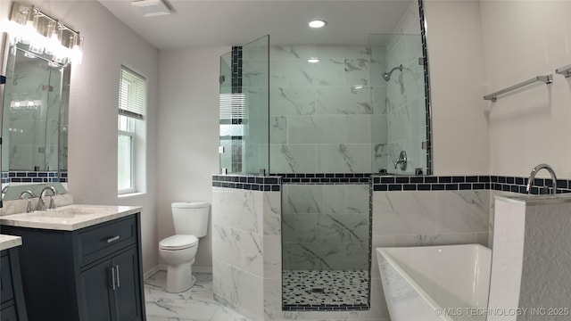 5921 S Sandusky Ave, Tulsa, OK 74135 - full bath featuring a freestanding tub, marble finish floors, vanity, a tile shower, and recessed lighting