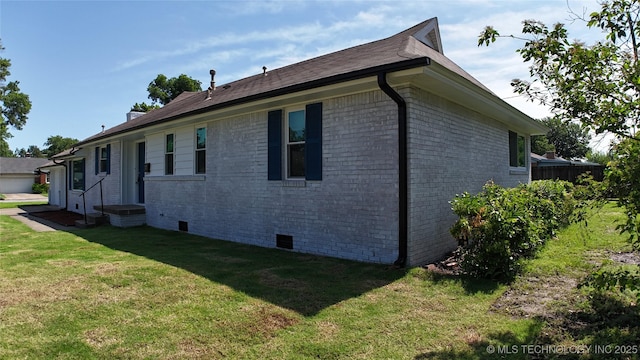 5921 S Sandusky Ave, Tulsa, OK 74135 - view of property exterior with crawl space, a lawn, and brick siding