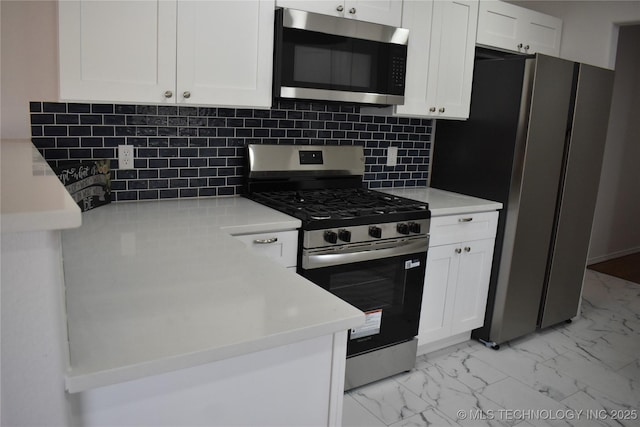 5921 S Sandusky Ave, Tulsa, OK 74135 - kitchen with stainless steel appliances, light marble finish floors, white cabinets, and backsplash