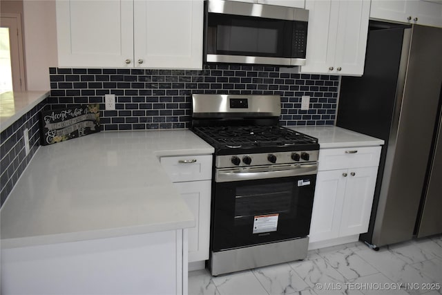 5921 S Sandusky Ave, Tulsa, OK 74135 - kitchen with appliances with stainless steel finishes, light marble finish floors, white cabinetry, and light countertops