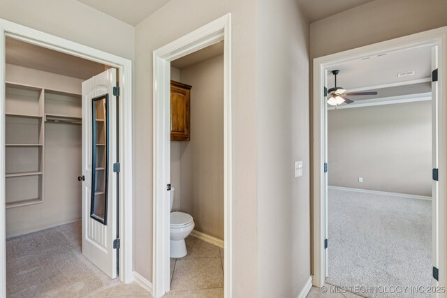 9200 E 92nd Pl, Owasso, OK 74055 - bathroom featuring toilet and ceiling fan
