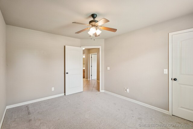 9200 E 92nd Pl, Owasso, OK 74055 - carpeted empty room featuring a ceiling fan and baseboards
