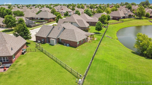 9200 E 92nd Pl, Owasso, OK 74055 - aerial view of residential area with a large body of water