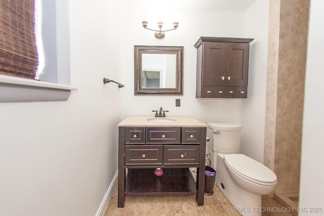 7025 E 58th Pl, Tulsa, OK 74145 - bathroom with vanity and toilet