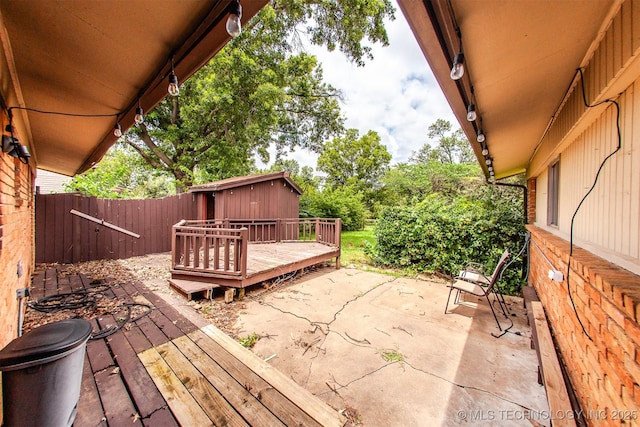 7025 E 58th Pl, Tulsa, OK 74145 - deck featuring a patio area and a fenced backyard