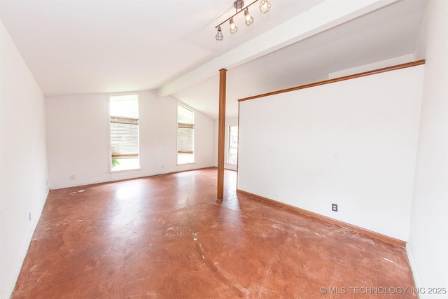 7025 E 58th Pl, Tulsa, OK 74145 - spare room featuring finished concrete floors and baseboards