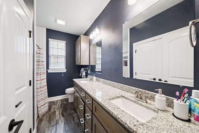 1909 W Nashville St, Broken Arrow, OK 74012 - bathroom with double vanity, wood finished floors, and a shower with curtain