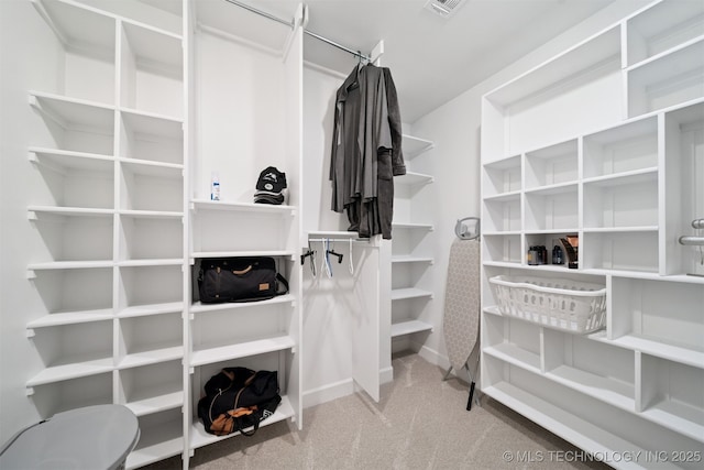 1909 W Nashville St, Broken Arrow, OK 74012 - walk in closet featuring carpet