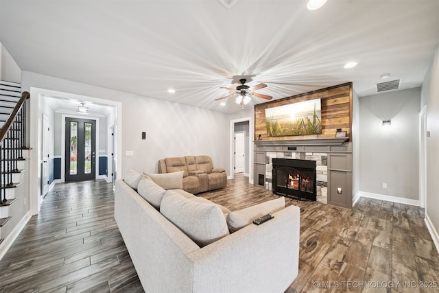 1909 W Nashville St, Broken Arrow, OK 74012 - living room featuring stairs, recessed lighting, a stone fireplace, dark wood-style flooring, and ceiling fan