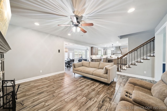 1909 W Nashville St, Broken Arrow, OK 74012 - living area featuring ceiling fan, stairs, wood finished floors, and recessed lighting