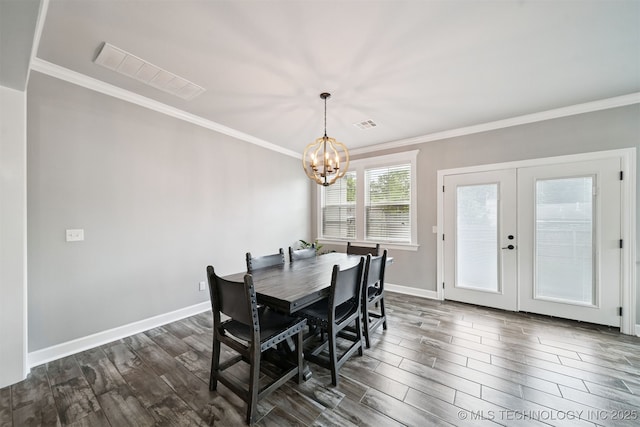 1909 W Nashville St, Broken Arrow, OK 74012 - dining space with a chandelier, dark wood-style flooring, crown molding, and french doors