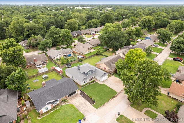 1909 W Nashville St, Broken Arrow, OK 74012 - aerial perspective of suburban area with a forest