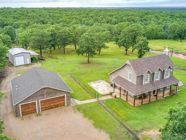 333 Springview Dr, Skiatook, OK 74070 - aerial view of property and surrounding area with a heavily wooded area