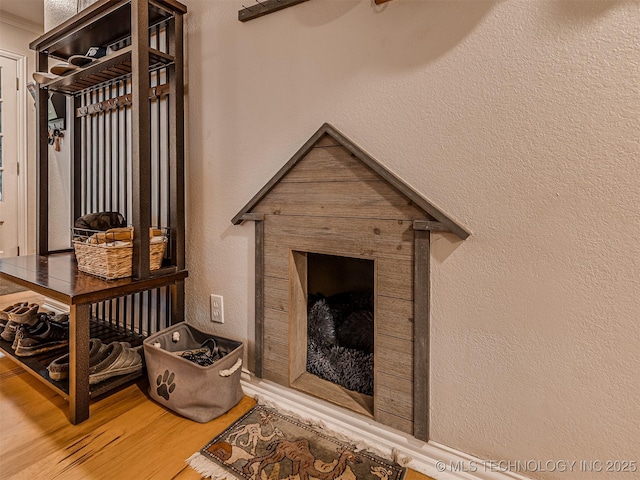 333 Springview Dr, Skiatook, OK 74070 - detailed view of wood finished floors and a textured wall