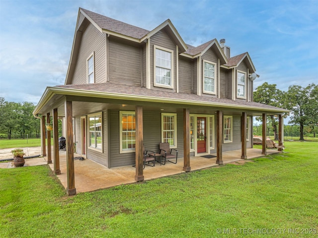 333 Springview Dr, Skiatook, OK 74070 - back of property featuring a lawn, roof with shingles, and a chimney