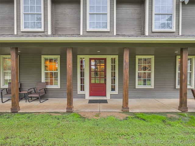 333 Springview Dr, Skiatook, OK 74070 - entrance to property with covered porch and a yard