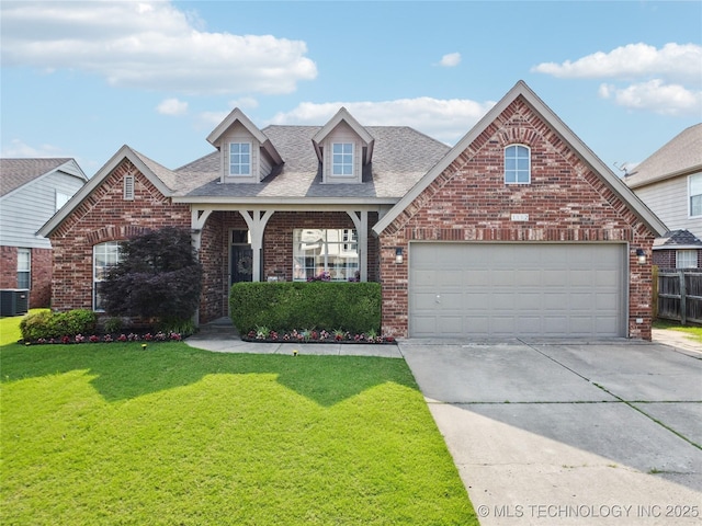 1112 N Yellowood Ave, Broken Arrow, OK 74012 - view of front of property featuring brick siding, concrete driveway, a front yard, roof with shingles, and an attached garage