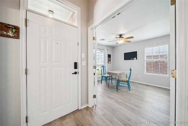 1112 N Yellowood Ave, Broken Arrow, OK 74012 - entrance foyer featuring light wood-style flooring and a ceiling fan