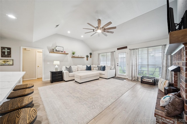 1112 N Yellowood Ave, Broken Arrow, OK 74012 - living room featuring lofted ceiling, ceiling fan, light wood finished floors, and recessed lighting