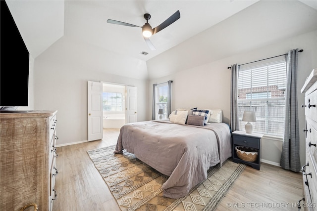1112 N Yellowood Ave, Broken Arrow, OK 74012 - bedroom featuring light wood-style floors, ensuite bathroom, ceiling fan, and vaulted ceiling