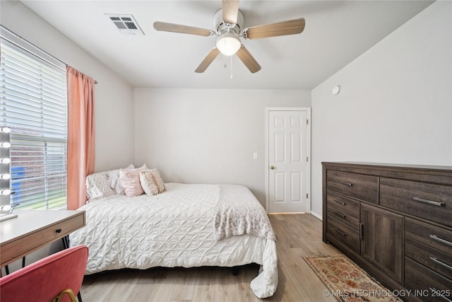 1112 N Yellowood Ave, Broken Arrow, OK 74012 - bedroom featuring light wood-style floors and a ceiling fan