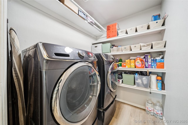 1112 N Yellowood Ave, Broken Arrow, OK 74012 - washroom with independent washer and dryer and wood finished floors