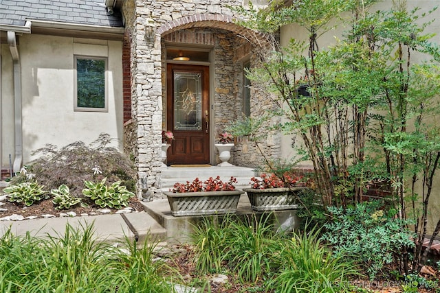 9632 S Vandalia Ave, Tulsa, OK 74137 - view of exterior entry with stone siding and stucco siding