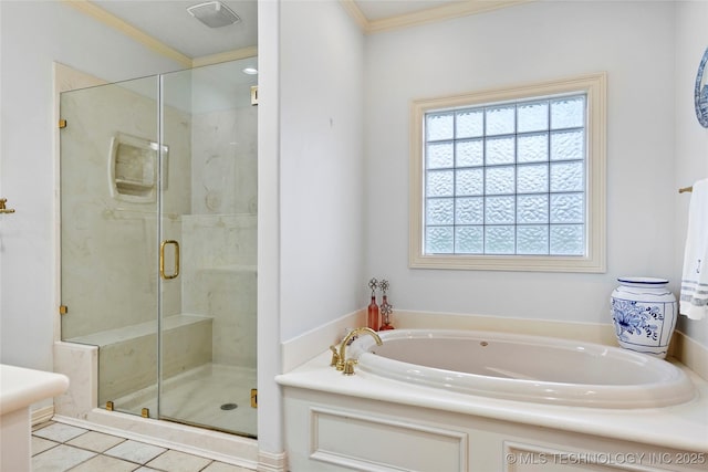 9632 S Vandalia Ave, Tulsa, OK 74137 - bathroom with a bath, a stall shower, ornamental molding, and tile patterned floors
