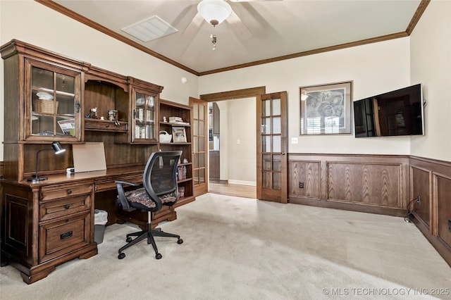 9632 S Vandalia Ave, Tulsa, OK 74137 - home office featuring light colored carpet, ceiling fan, crown molding, and wainscoting