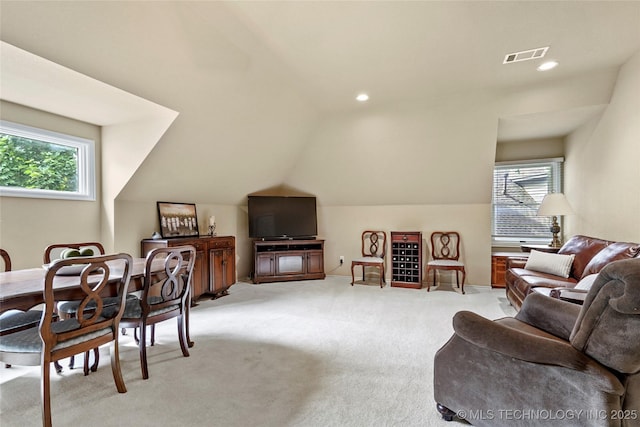 9632 S Vandalia Ave, Tulsa, OK 74137 - living area with plenty of natural light, vaulted ceiling, light carpet, and recessed lighting