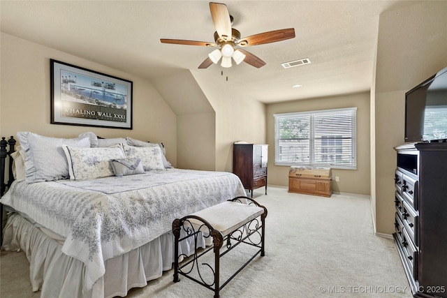 9632 S Vandalia Ave, Tulsa, OK 74137 - bedroom featuring light carpet, multiple windows, ceiling fan, and lofted ceiling