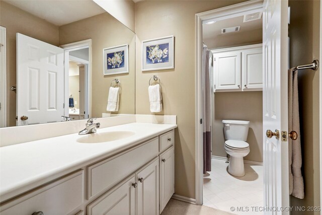 9632 S Vandalia Ave, Tulsa, OK 74137 - bathroom with vanity and tile patterned flooring