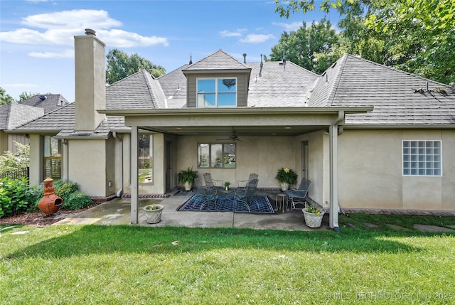9632 S Vandalia Ave, Tulsa, OK 74137 - back of house with ceiling fan, a patio area, a yard, a chimney, and stucco siding