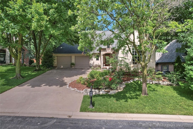 9632 S Vandalia Ave, Tulsa, OK 74137 - obstructed view of property with concrete driveway, a front yard, and an attached garage