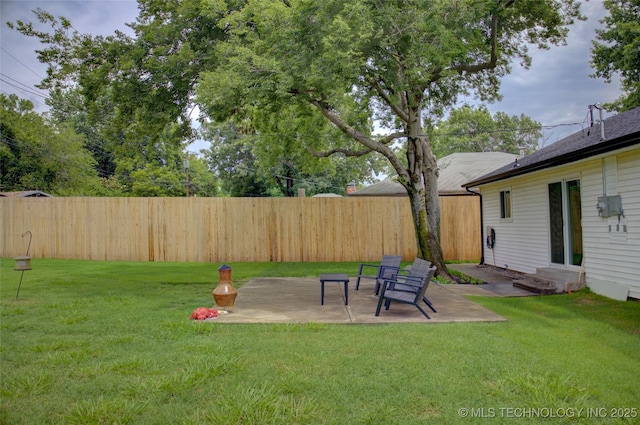 3634 S Pittsburg Ave, Tulsa, OK 74135 - fenced backyard featuring entry steps and a patio